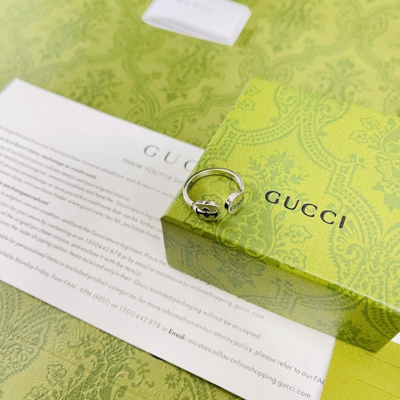 G*u*i earrings